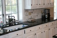 White Kitchen Cabinets With Black Countertops
